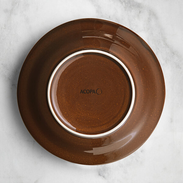 A brown bowl with a white rim.