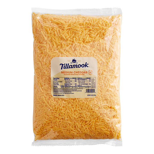A Tillamook 5 lb. bag of shredded yellow cheddar cheese.