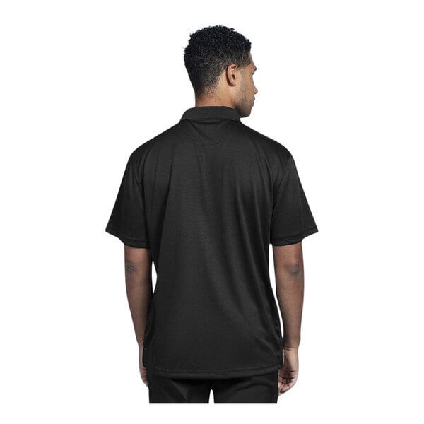 A man wearing a black Uncommon Chef polo shirt.