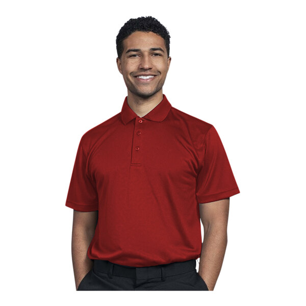 A man wearing a red Uncommon Chef polo shirt smiling.