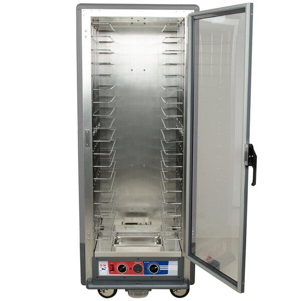 A gray Metro C5 heated holding and proofing cabinet with shelves and a clear glass door.