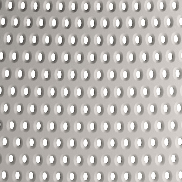 A white resin chair with a hole pattern on the seat.