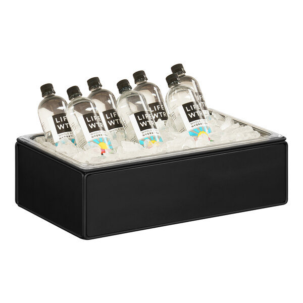 A black Cal-Mil Onyx ice housing container with bottles of water in it.
