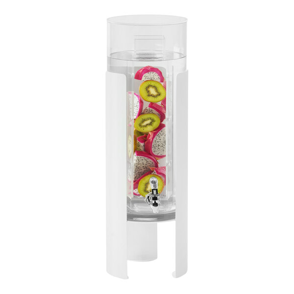 A Cal-Mil beverage dispenser with fruit inside on a white metal base.