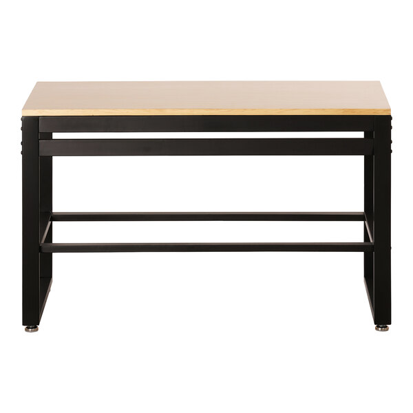 A Cal-Mil maple nesting table with a black frame and wooden top.