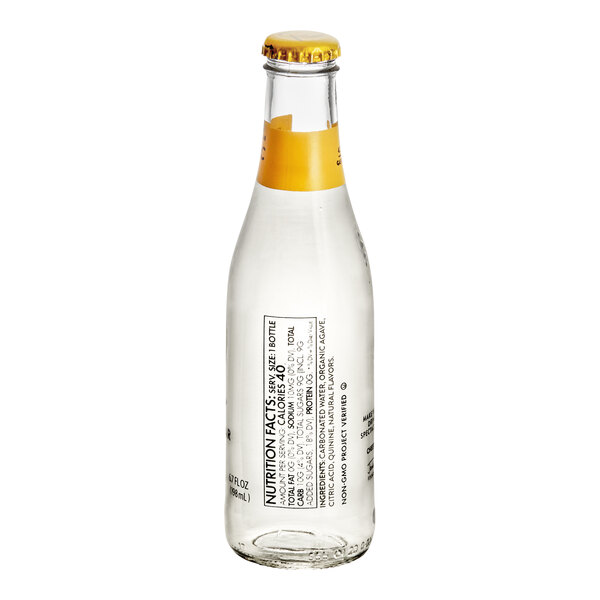 A case of 24 Q Mixers Premium Tonic Water glass bottles with black and yellow labels.