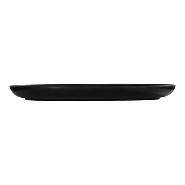 A black Cal-Mil Oslo melamine platter on a table.