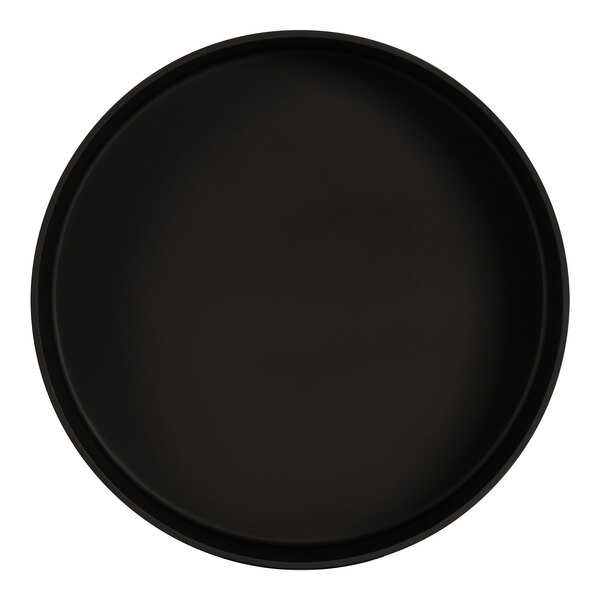 A black oval melamine bowl with white background.