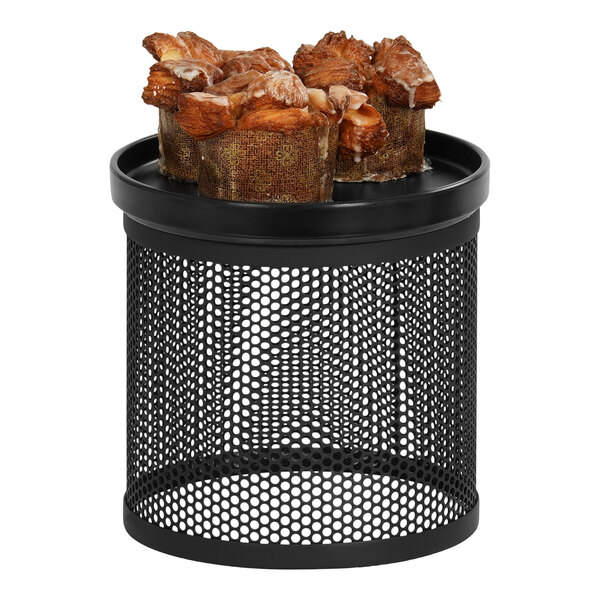 A black Cal-Mil metal display stand with brown muffins in a metal mesh basket.