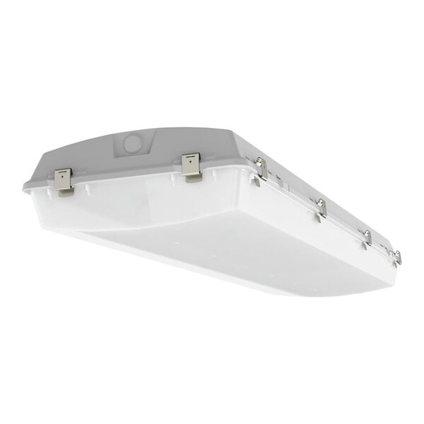 A white rectangular XtraLight vapor-tight light fixture with metal clasps.