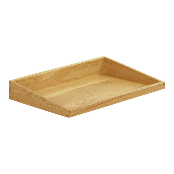 An oak wooden box with an angled corner on a table.