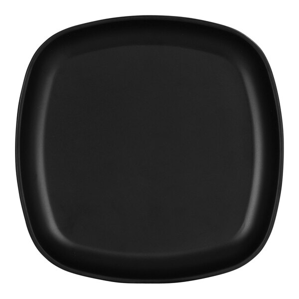 A close up of a black square Cal-Mil melamine plate with a white border.