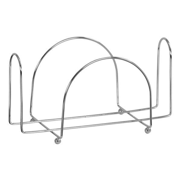 A silver chrome wire napkin holder with two metal legs.