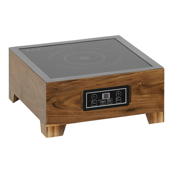 A square wooden countertop with a black induction cooktop panel.