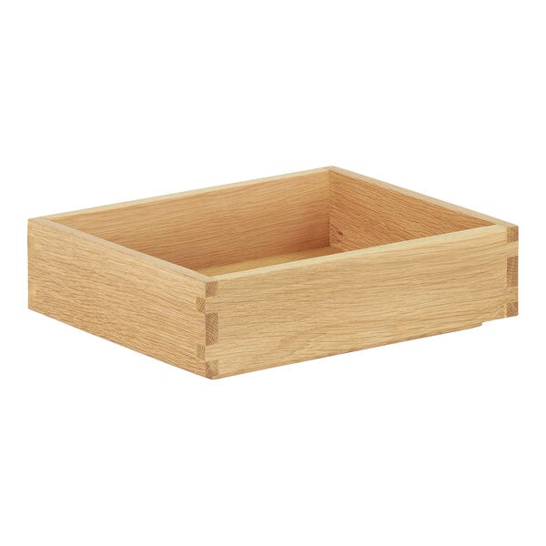 A wooden oak display box with corners and a handle.