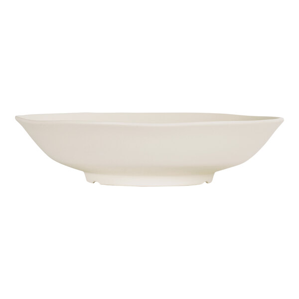 A Cal-Mil ivory melamine serving bowl.