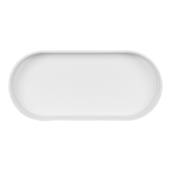 A white oval raised rim serving bowl.