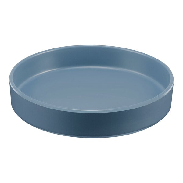 A Cal-Mil Hudson stone blue melamine plate with a raised rim.