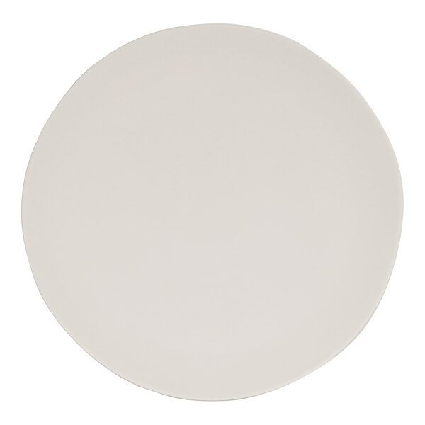 A Cal-Mil ivory melamine coupe plate with a round white border.