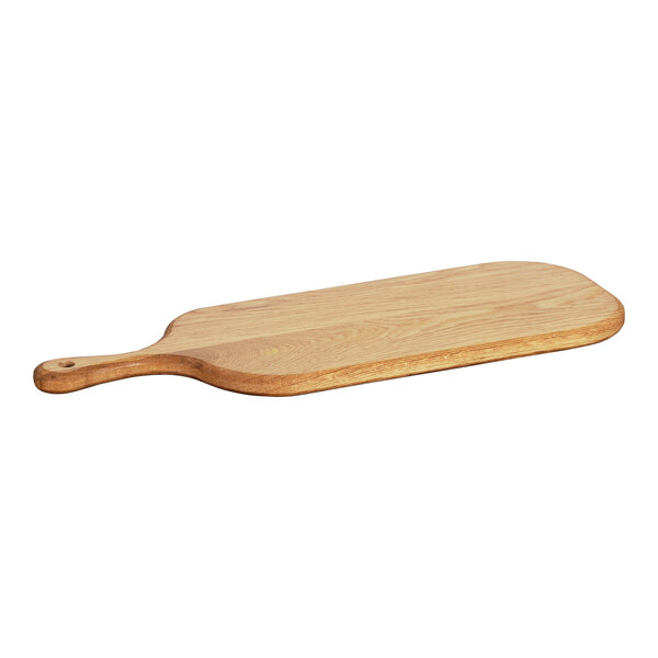 A Cal-Mil oak wooden serving board with a handle.