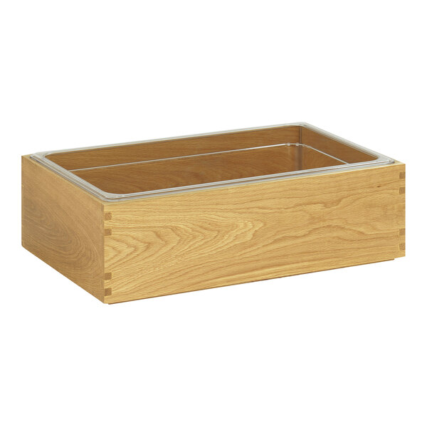 A Cal-Mil oak ice housing with clear lid.