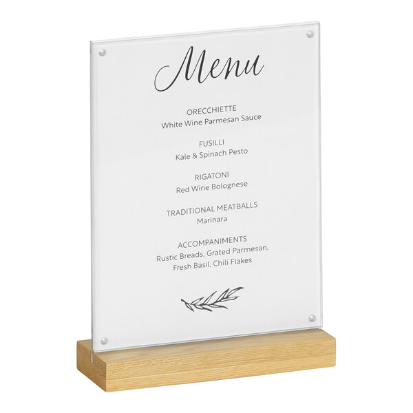 A Cal-Mil oak base menu card holder on a wooden stand.