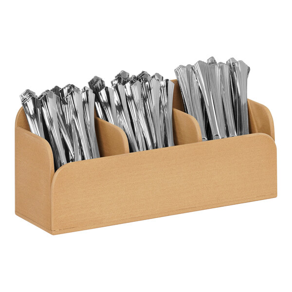 A Cal-Mil faux wood container with silver flatware inside.