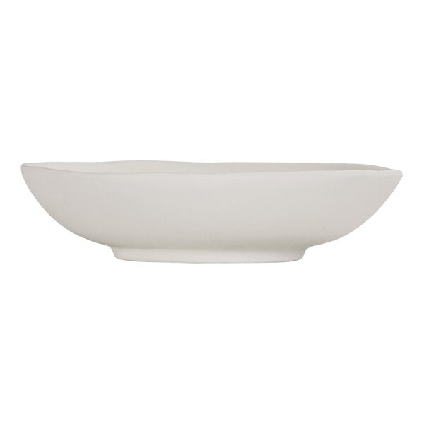 A Cal-Mil ivory melamine coupe bowl.