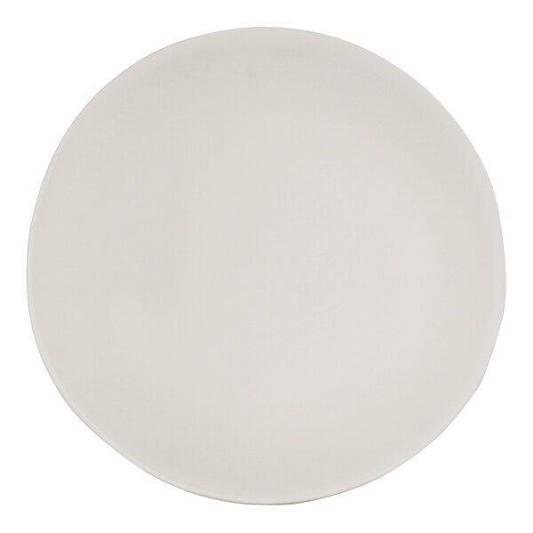 A Cal-Mil ivory melamine coupe bowl with a round rim on a white background.