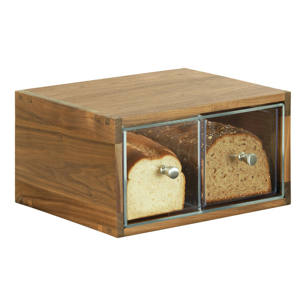 A wooden bread box with two loaves of bread inside.