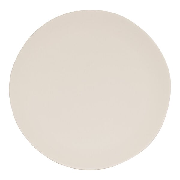 A white Cal-Mil melamine coupe plate with a round rim.