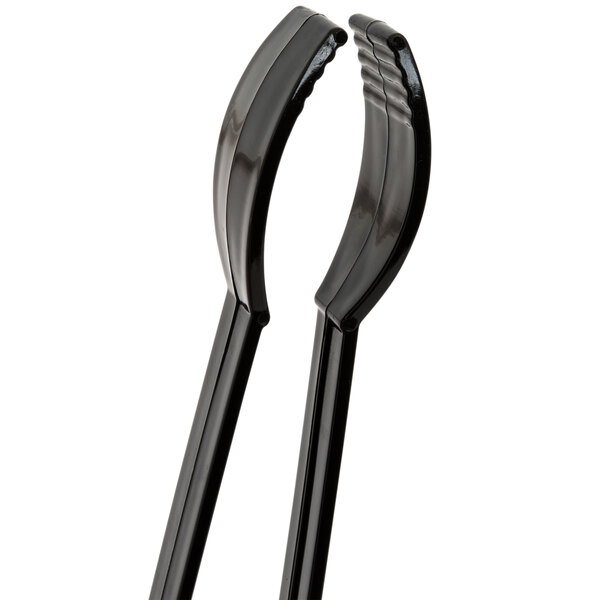 A close-up of a pair of Fineline black plastic tongs.