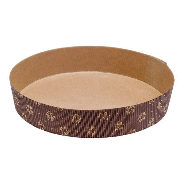 A round brown box with a brown lid containing brown and gold paper tart baking molds.