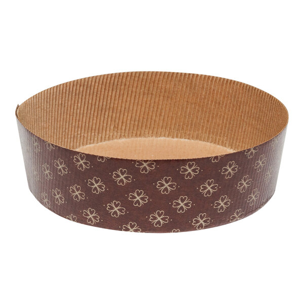 A brown paper baking mold with a brown circle pattern.