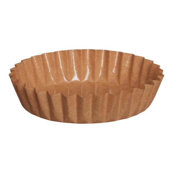 A close-up of a brown paper Welcome Home Brands baking cup.