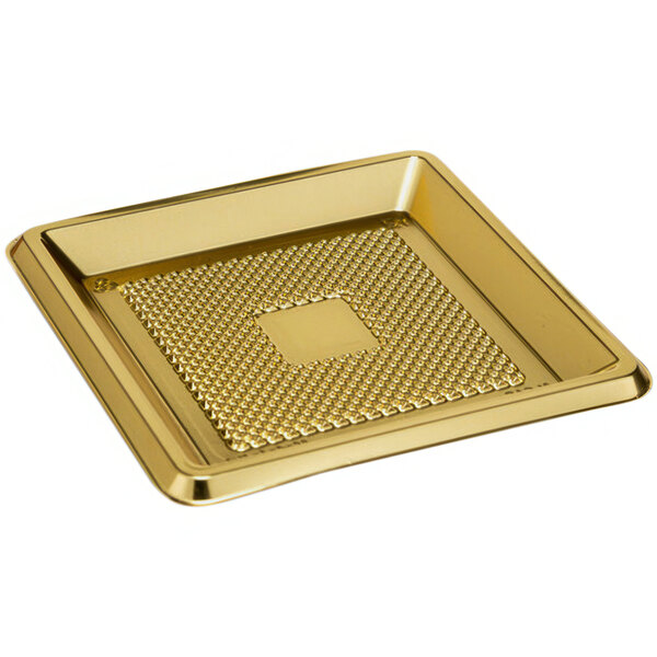 A gold square plastic tray with a square design.