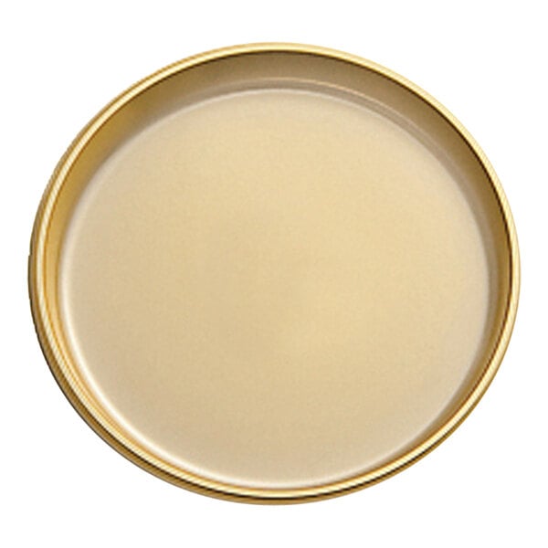 A round gold PET plastic tray.