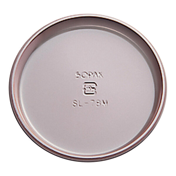 A Welcome Home Brands rose pink plastic tray lid with a logo.