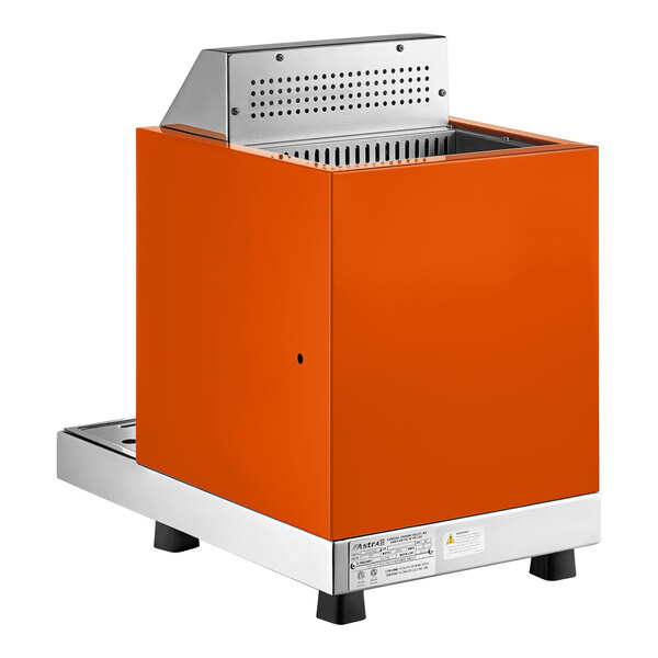 An orange automatic milk and beverage steamer with two wands and a stainless steel base.