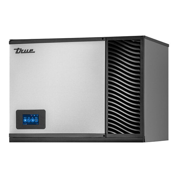 A silver and black True Ice air cooled ice machine with a blue digital display.