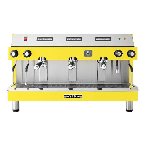 A yellow and silver Astra Mega III espresso machine.