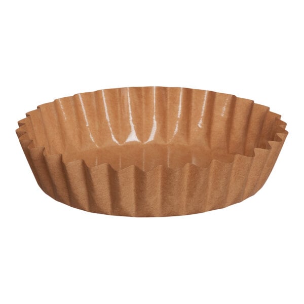 A close-up of a brown paper Welcome Home Brands baking cup with a white background.