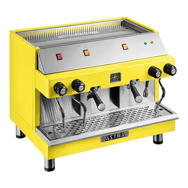 A yellow Astra Mega II semi-automatic espresso machine with dual group heads and steam wands.
