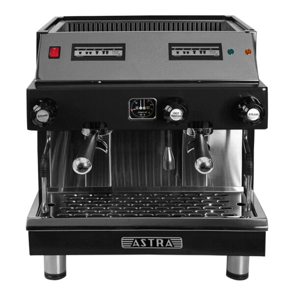 An Astra Mega II black and silver compact espresso machine with two coffee cups on top.