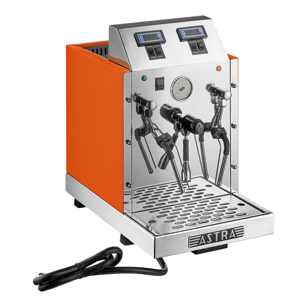An orange and stainless steel automatic milk and beverage steamer with two wands and digital controls.