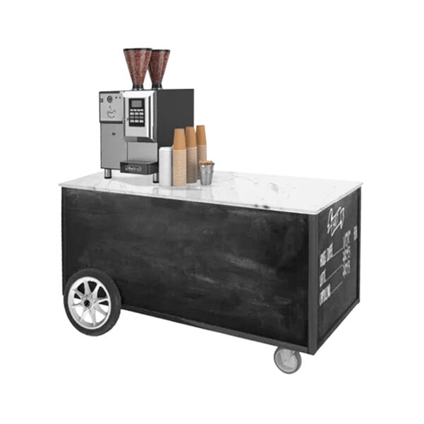 A black and white Astra mobile chalk board coffee cart with a coffee machine and cups on it.