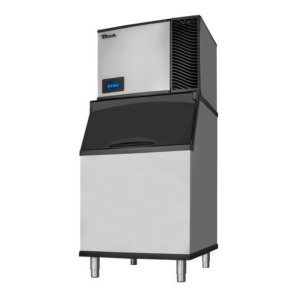 A True Ice air cooled small cube ice machine on a counter with a stainless steel surface.