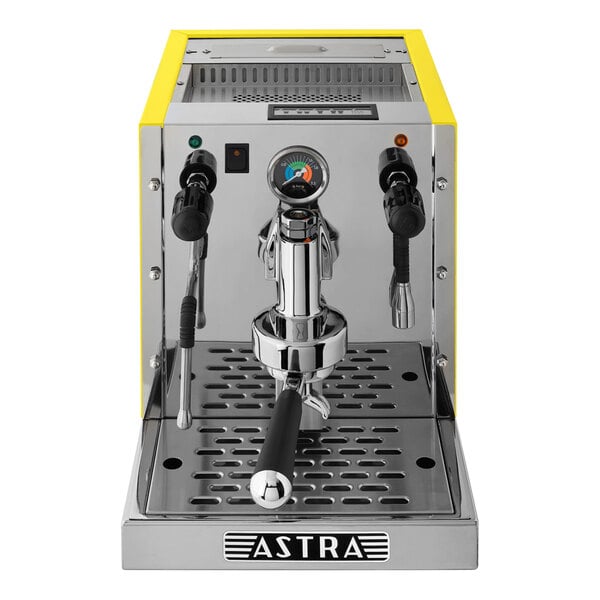 An Astra Gourmet yellow and silver automatic pourover espresso machine.
