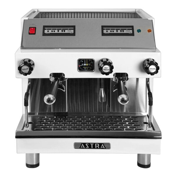A white and silver Astra Mega II compact espresso machine with knobs and buttons. Two coffee cups sit on top.