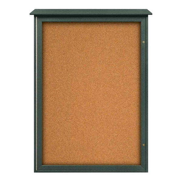 A cork board with a green frame and black trim.